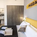 Pizzasleep Station Apartment